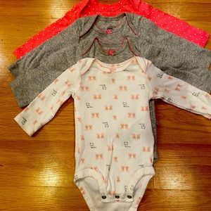 Carter’s 4pk Long Sleeve Onesies 0-3m